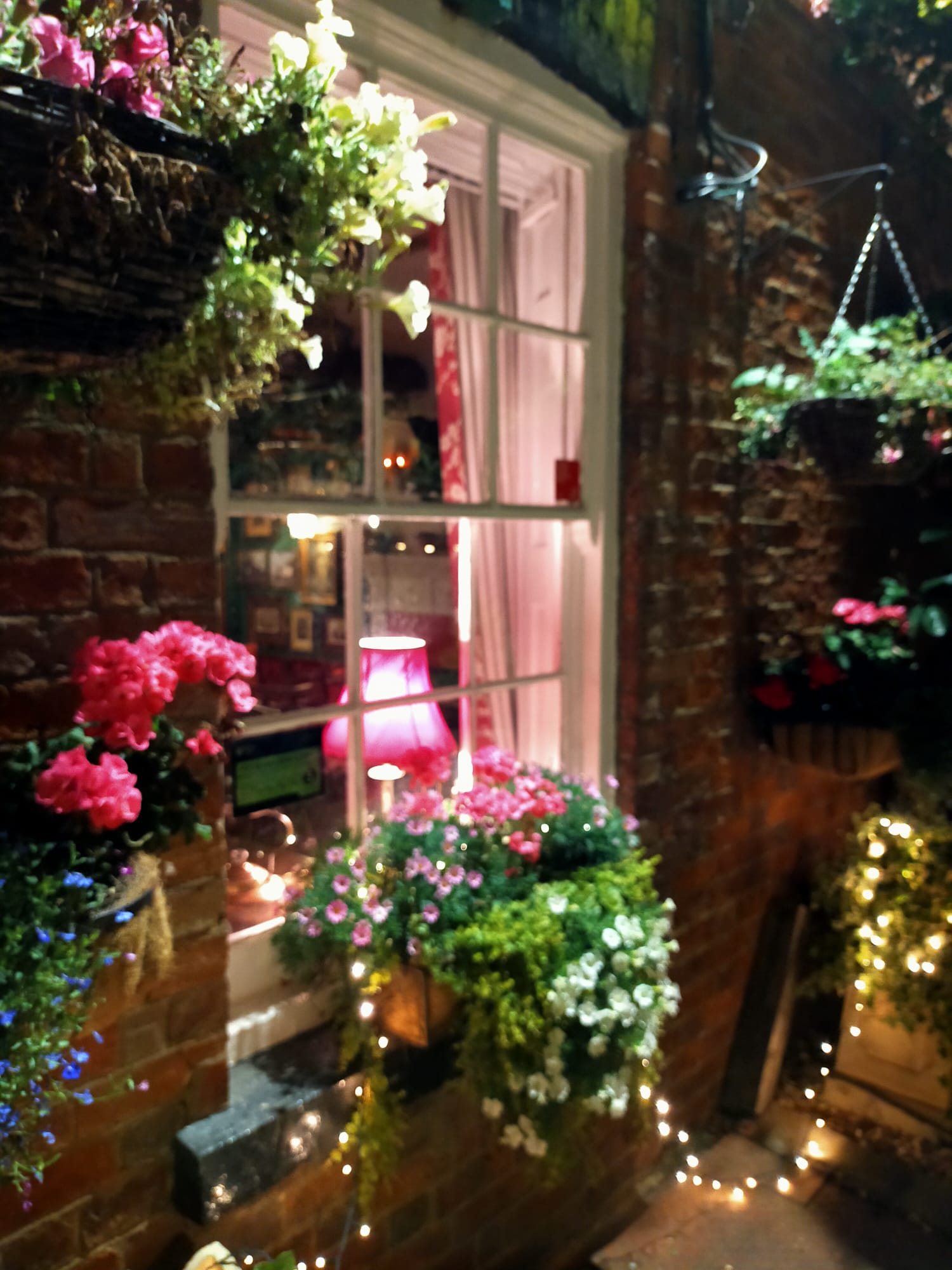 A peek inside the Folly Pub from an exterior window